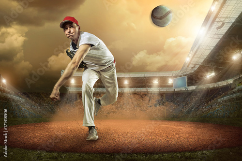 Photography Baseball players in action on the stadium.