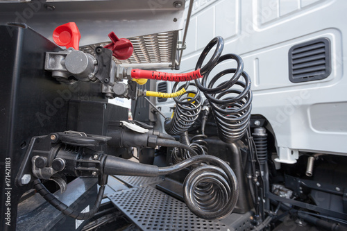 Engine and compressed air hoses of a truck