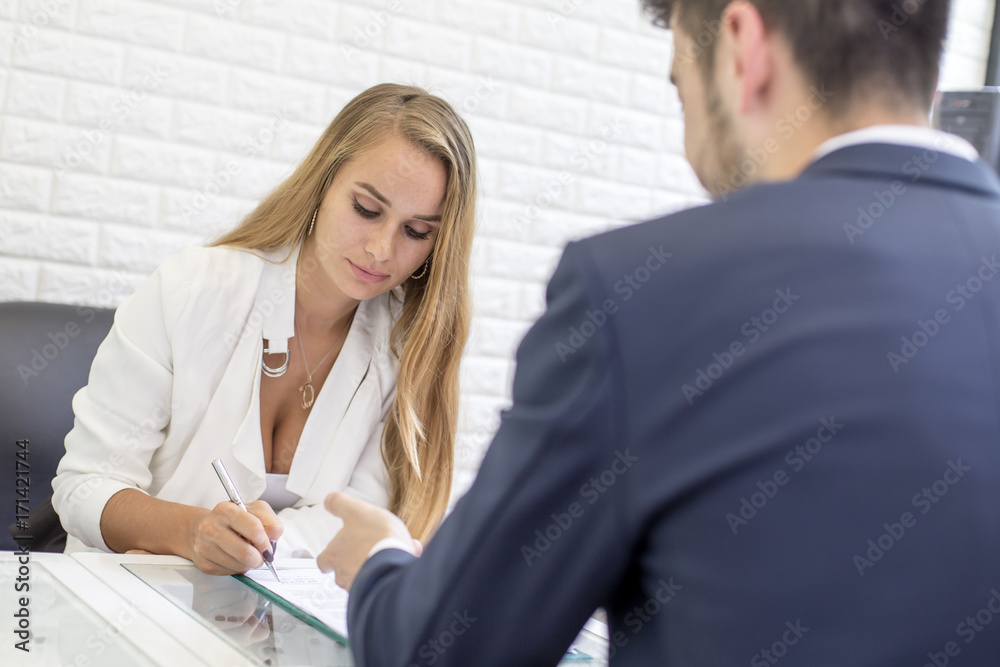 Woman signing contract for work, Woman working concepr. Woman signing contract for work, Woman working concepr.