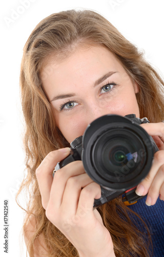Beautiful smiling woman with digital camera, on white