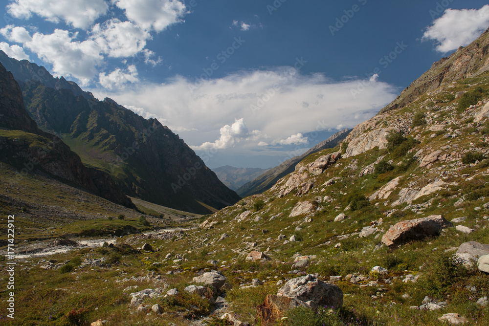 Russia, Republic of Kabardino-Balkaria, time lapse. Summer in the mountains of the Caucasus. Formation and movement of clouds over mountains peaks.