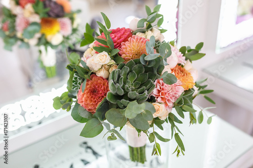Fototapeta Naklejka Na Ścianę i Meble -  bright wedding bouquet of summer dahlias and roses