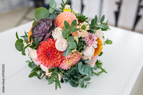 Fototapeta Naklejka Na Ścianę i Meble -  bright wedding bouquet of summer dahlias and roses