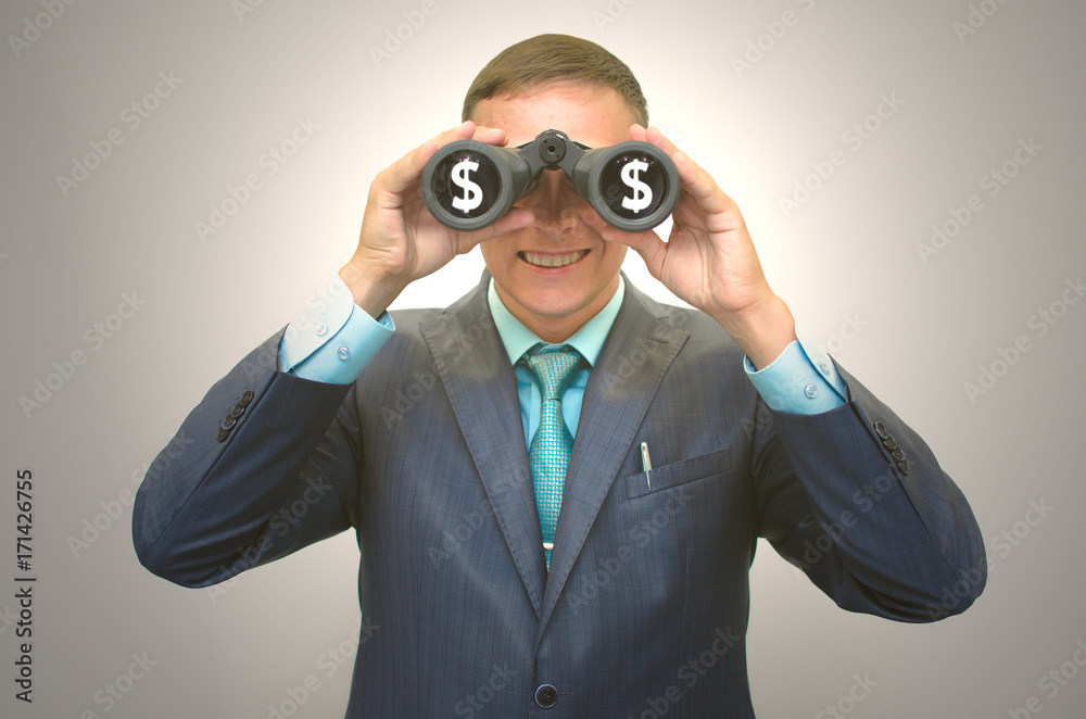 Thirst for money. Search of investment. Greed. Businessman in suit with binoculars with dollar money symbol in hand looking for money. Thirst for money. Search of investment. Greed. Businessman in suit with binoculars with dollar money symbol in hand looking for money.