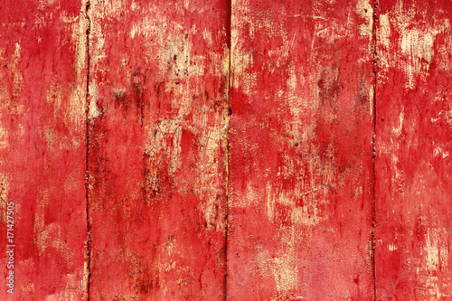 Red grunge background. Texture of painted old metal. © maxim850