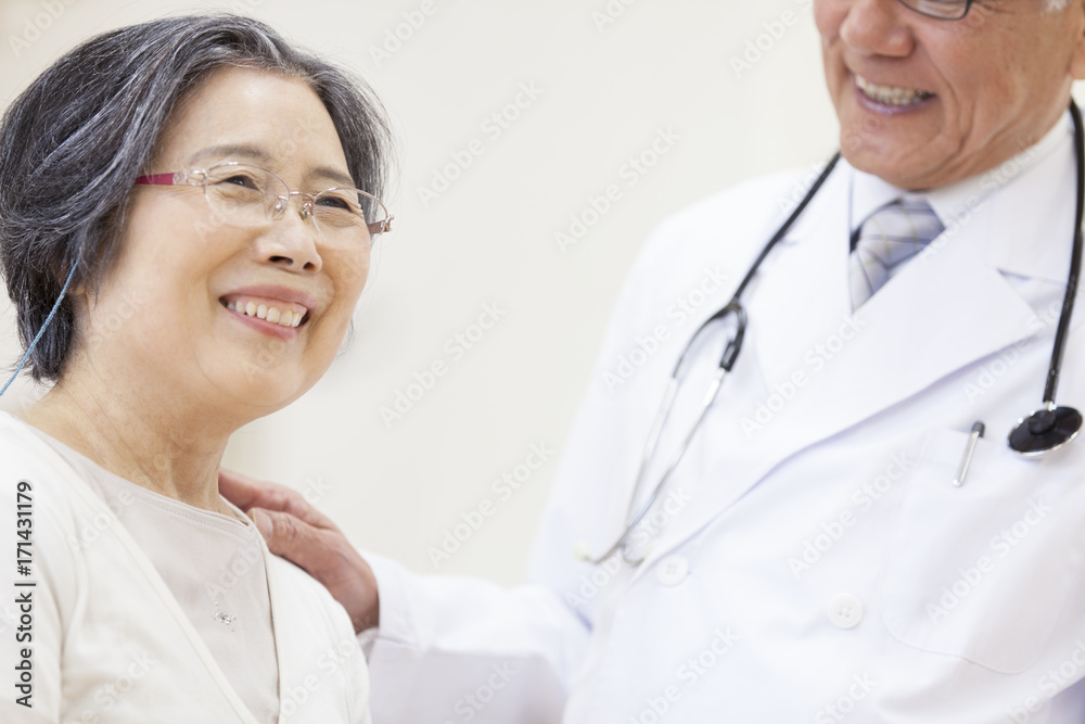 Cheerful patient and male doctor Cheerful patient and male doctor