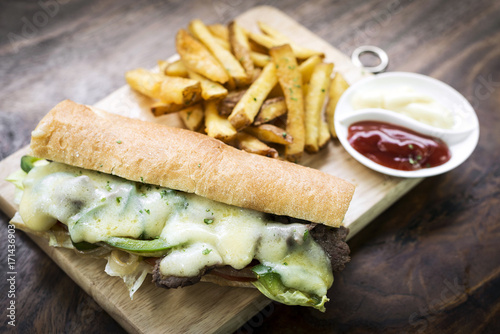 gourmet Philly Cheesesteak Sandwich with fries