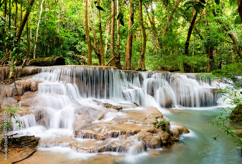 Fototapeta Naklejka Na Ścianę i Meble -  Beautiful waterfall in the national park forest at Huai Mae Khamin Waterfall, Kanchanaburi Thailand