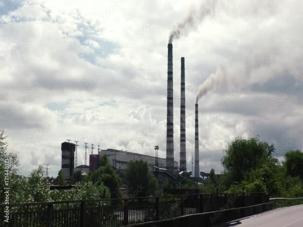 Thermal power plants. Pipes are emitting smoke in the air. Thermal power plants. Pipes are emitting smoke in the air.