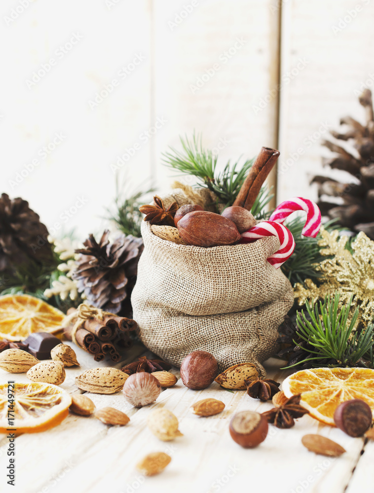 New Year or Christmas composition with walnuts, mulled wine, hazelnuts New Year or Christmas composition with walnuts, mulled wine, hazelnuts