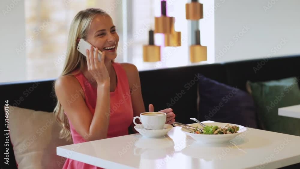 woman with coffee calling smartphone at restaurant woman with coffee calling smartphone at restaurant