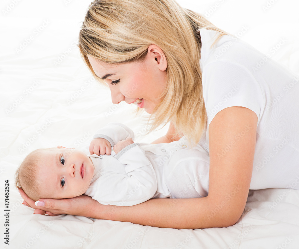 Mother and baby playing and smiling. Happy family. isolated, Mother and baby playing and smiling. Happy family. isolated,