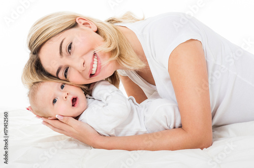 Mother and baby playing and smiling. Happy family. isolated,