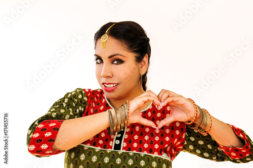 Fotografie Woman dancing Indian dance in national dress