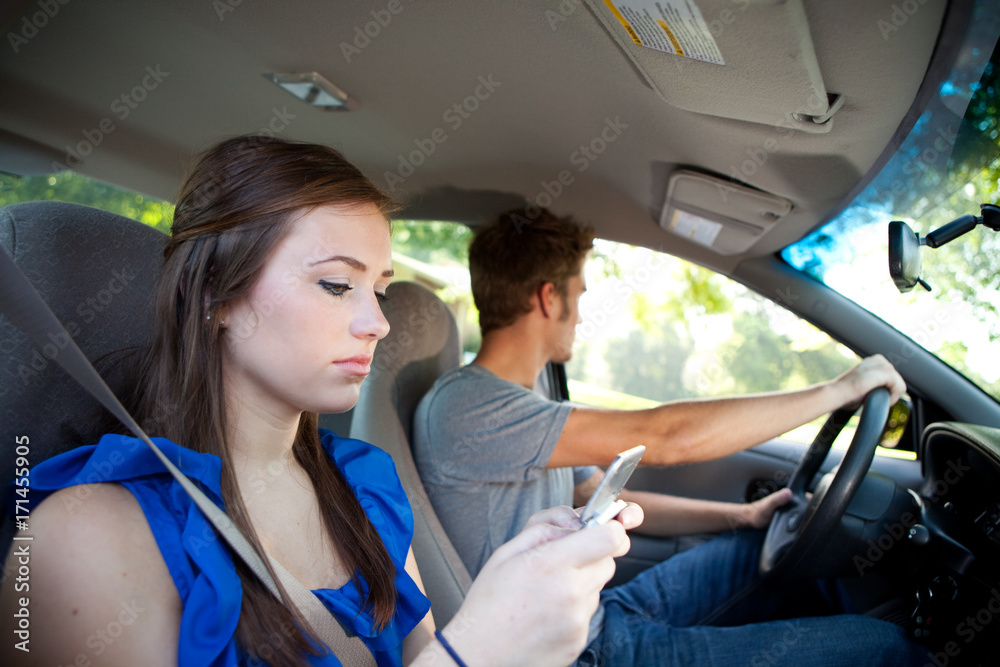 Driving: Teen Female Texts While Riding in Car Driving: Teen Female Texts While Riding in Car