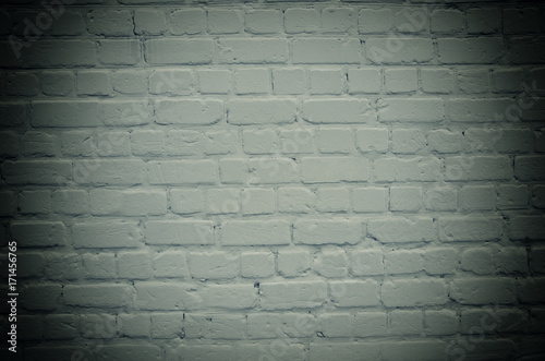 Brick wall with dark edges  as an abstract gloomy background   retro style