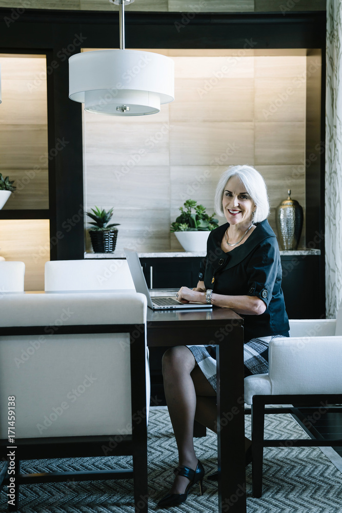 Portrait of smiling businesswoman in office Portrait of smiling businesswoman in office
