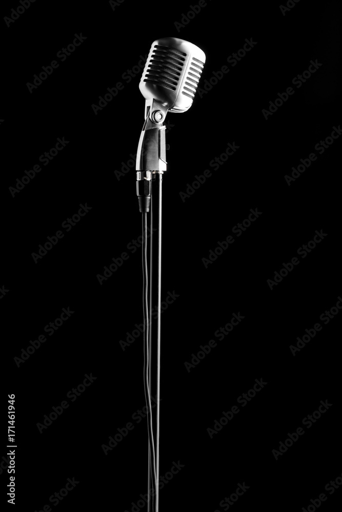 Obraz premium vintage microphone over black