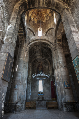 The interior with the altar of the church of the Blessed Virgin Ozun Monastery./Armenia. The Ozun Monastery. The interior with the altar of the church of the Blessed Virgin.