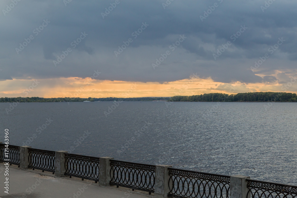 The view on the river Volga embankment in Samara, Russia. Scenic sky sunset.