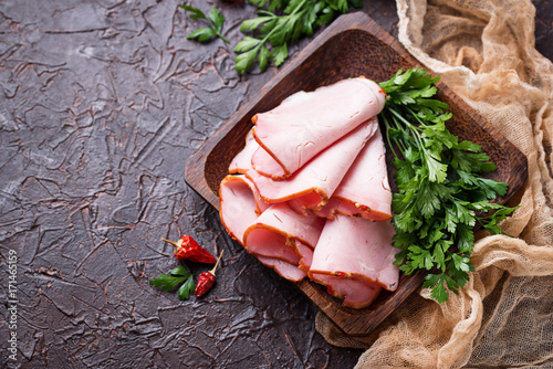 Fototapeta Naklejka Na Ścianę i Meble -  Sliced ham with spices