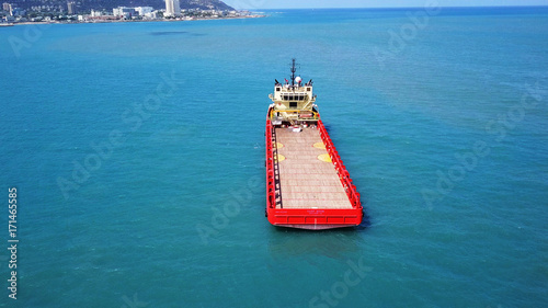 Large bulk carrier ship sailing in open ocean
