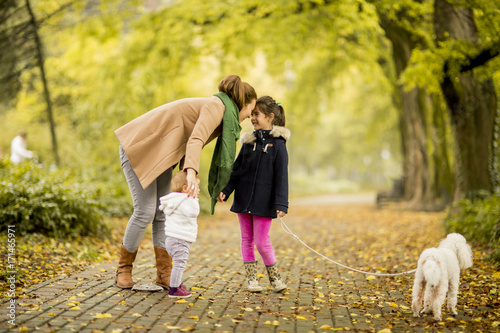 Mother and two girls walkin...
