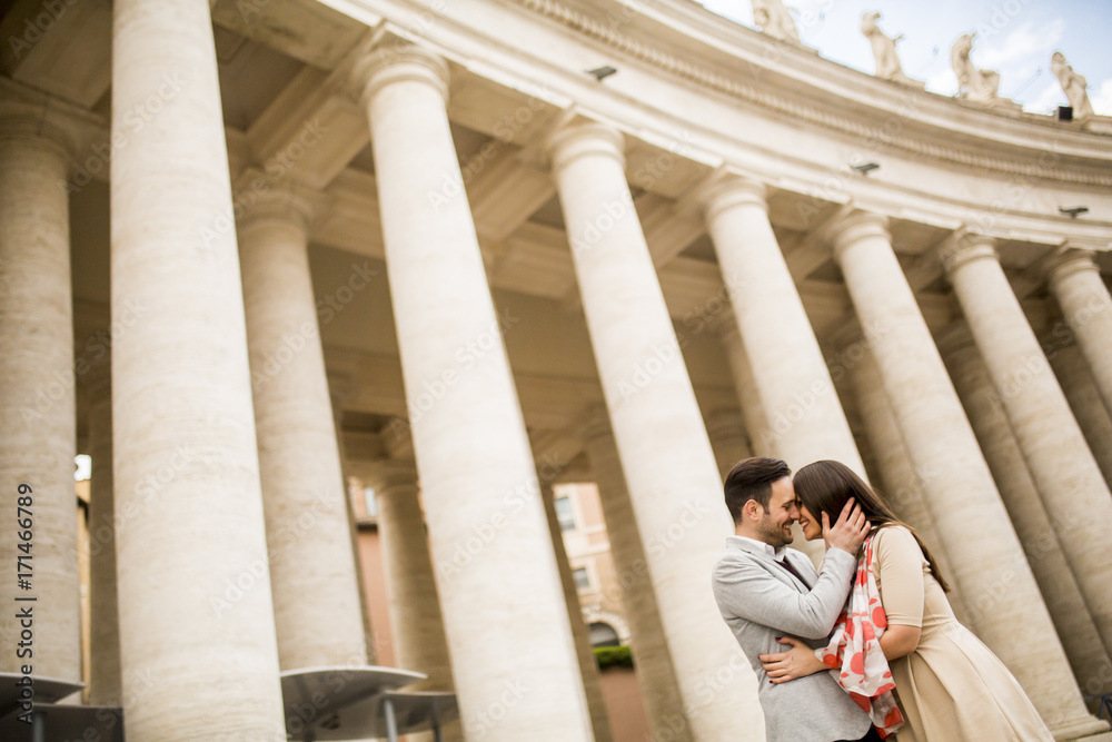 Loving couple at the St. Peter's Square in Vatican Loving couple at the St. Peter's Square in Vatican