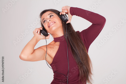 woman listening to music on headphones III