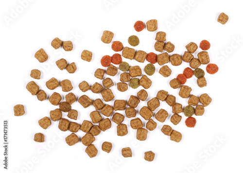 Dry dog food isolated on white background, top view