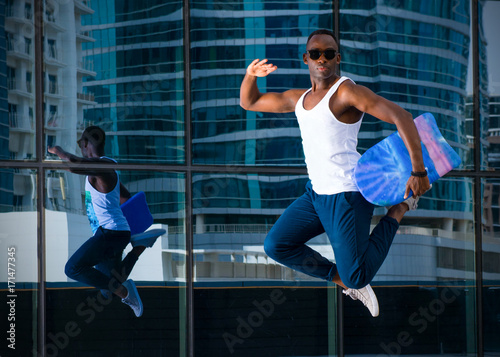 Young Energetic Guy Jumping © Tomasz