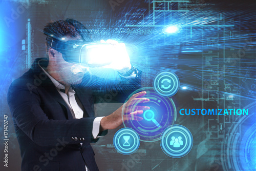 Business, Technology, Internet and network concept. Young businessman working in virtual reality glasses sees the inscription: Customization