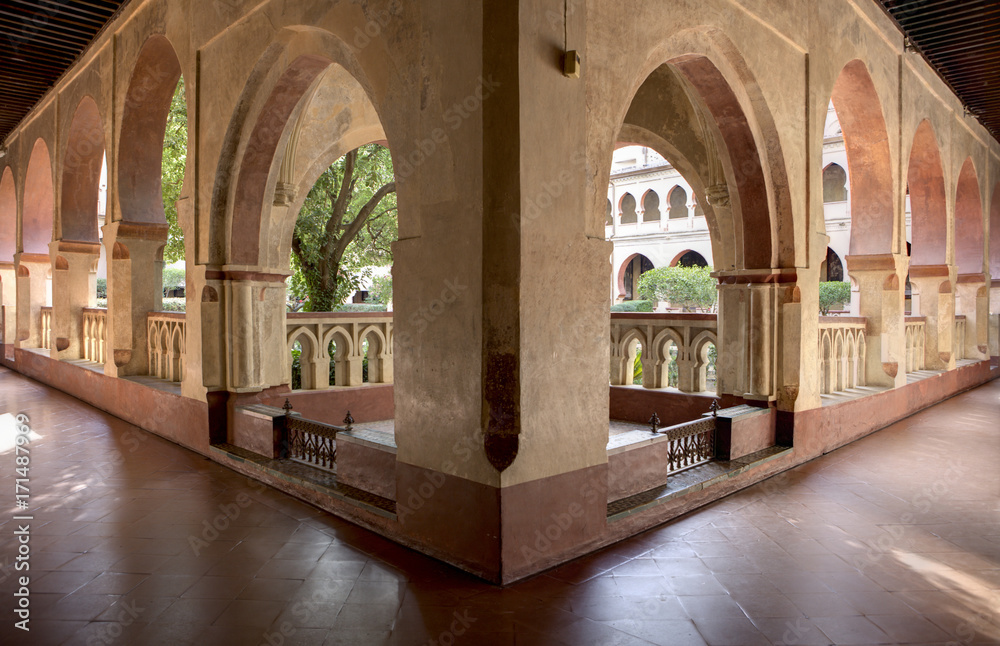 Open arcade gallery of Mudejar cloister of Guadalupe Monastery