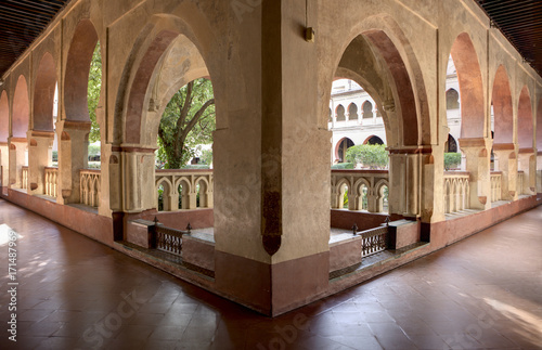 Open arcade gallery of Mudejar cloister of Guadalupe Monastery
