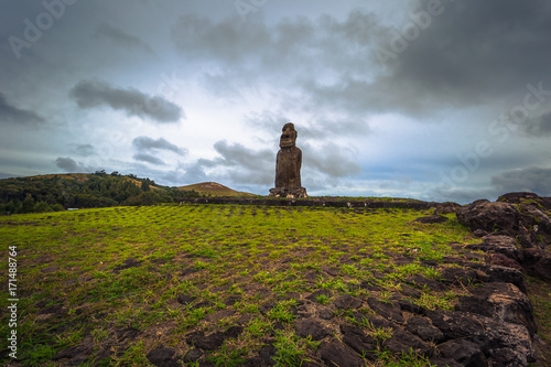 Ahu Kuri a Urenga, Easter Island - July 11, 2017: State of Moai at the sacred site photo