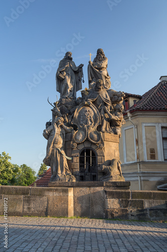 Statues of John of Matha, Felix of Valois and Saint Ivan on the south side of the Charles Bridge (Karluv most) in Prague, Czech Republic, on a sunny day.