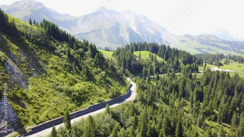 Drone flight over road in Swiss alps