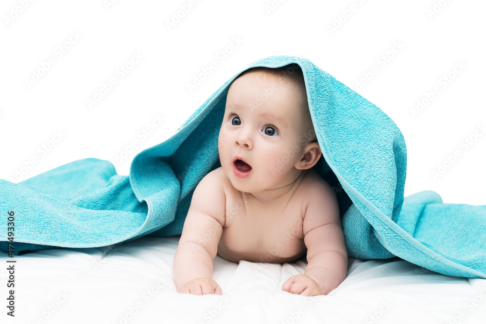Surprised baby girl or boy, with big blue eyes and opened mounth, after  shower with towel on head lying on soft blanket, isolated on white  background Stock Photo | Adobe Stock