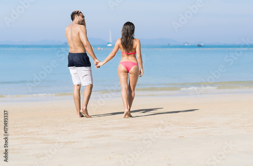 Couple On Beach Summer Vacation, Young People In Love Walking, Man Woman Holding Hands Sea Ocean Holiday Travel