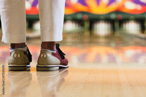 Series with senior adults set in a bowling alley. photo