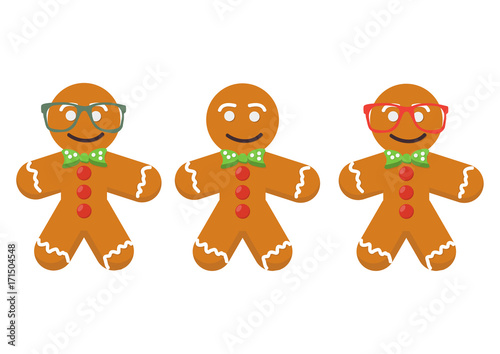 Vector set in a cartoon style: three cute Gingerbread men isolated. Christmas traditional sweet dessert cookies or biscuits characters. Gingerbread men are also Great for Saint Nicholas Day or Feast.
