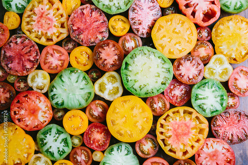 Multi colored heirloom tomatoes photo