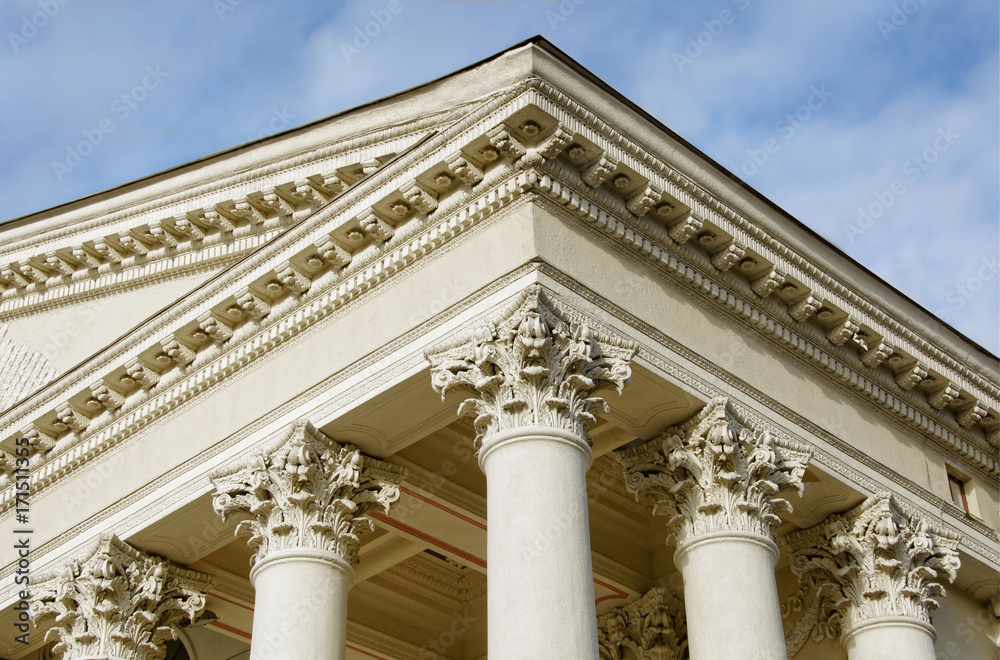 Courthouse. Supreme court. Ornate columns and a pediment in a style of classical architecture. Legal and order. Classic style. Justice. Law. Legal system. Court hearing. Lawsuit. Court proceeding