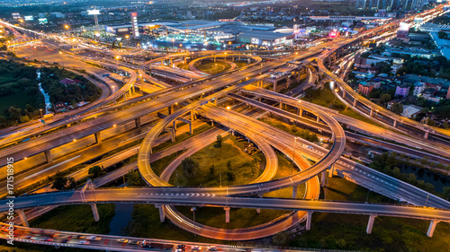 Fototapeta Naklejka Na Ścianę i Meble -  Aerial view of a Unique City Roads and Interchanges, Bangkok Expressway top view, Top view over the highway, expressway and motorway at night Aerial view from drone