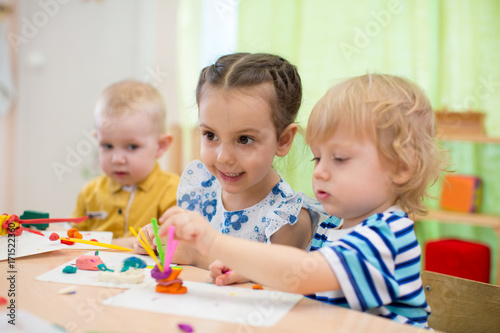 kids doing arts and crafts in day care centre