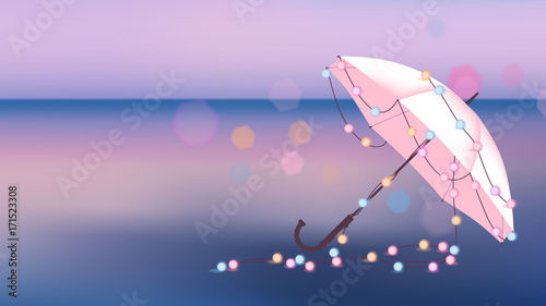 Decorate umbrella with glowing Christmas lights