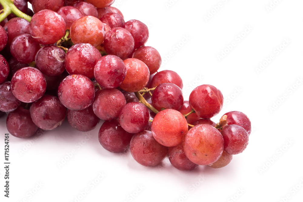 Red grapes on a white background.