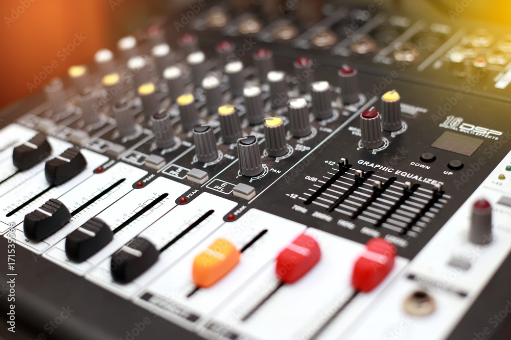 Closeup of an audio sound mixer.