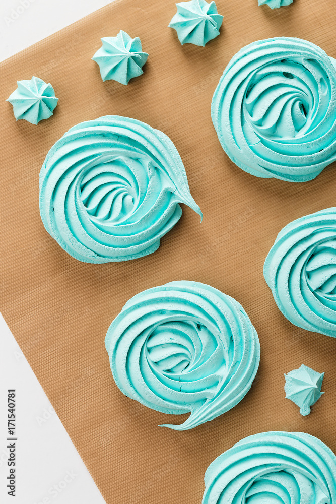 Home baked blue meringues cookies. Top view Home baked blue meringues cookies. Top view