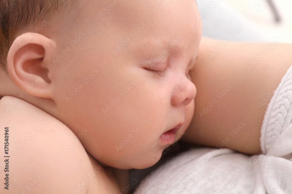 Cute sleeping newborn baby, closeup